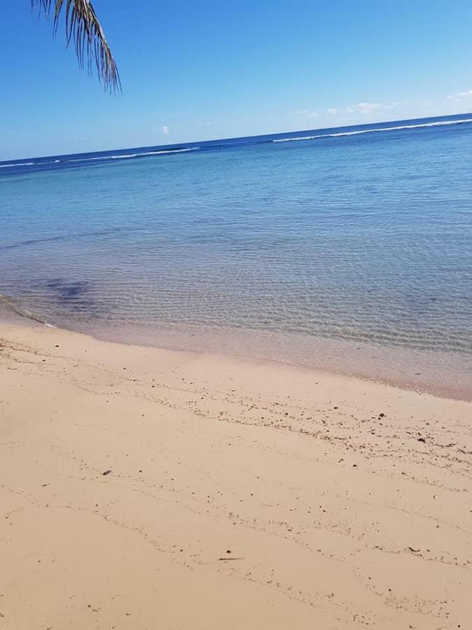 Отель Vacation Beach Fales Manase Экстерьер фото
